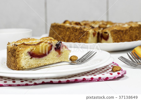 Homemade pie with almond frangipan and plums Homemade pie with almond frangipan and plums 37138649