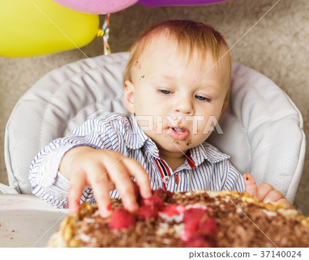 One year old boy celebrating his first Birthday 37140024