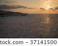 Shiretoko peninsula drifting ice and sunset view of Utoro Port 37141500