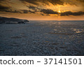 Shiretoko peninsula drifting ice and sunset view of Utoro Port 37141501