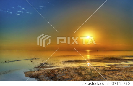 Sunset above Chott el Djerid, a dry lake in Sunset above Chott el Djerid, a dry lake in 37141730