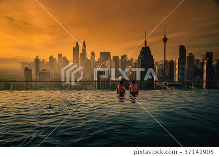 Two traveler man looking view skyline Kuala Lumpur Two traveler man looking view skyline Kuala Lumpur 37141908