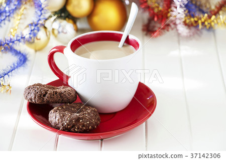 Chocolate oatmeal cookies with cup of coffee. Chocolate oatmeal cookies with cup of coffee. 37142306