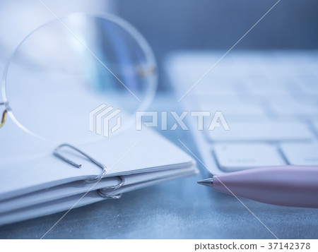 Business image · document · keyboard · glasses · female 37142378