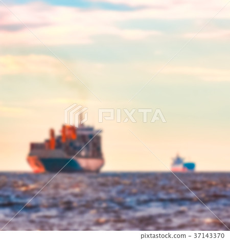Blue cargo ship - blurred image Blue cargo ship - blurred image 37143370