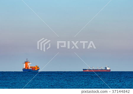 Blue container ship underway 37144842