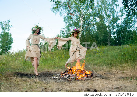Attractive girls jump through fire Attractive girls jump through fire 37145019