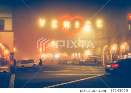 Night street and Venice Beach sign in Los Angeles 37145059