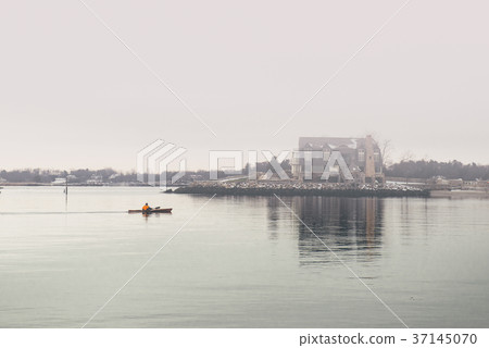 Scenic winter ocean shore nature with house on fog Scenic winter ocean shore nature with house on fog 37145070