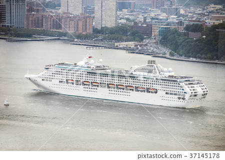 Cruise ship with passengers for ocean voyage  37145178