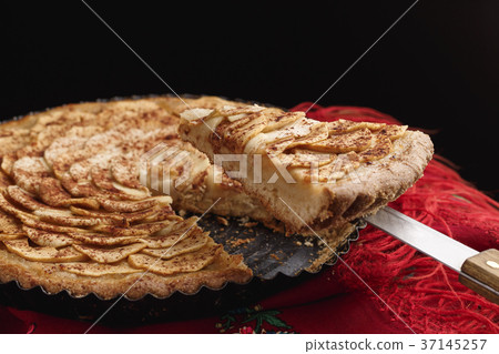 Apple tart on traditional Ukrainian headscarf Apple tart on traditional Ukrainian headscarf 37145257