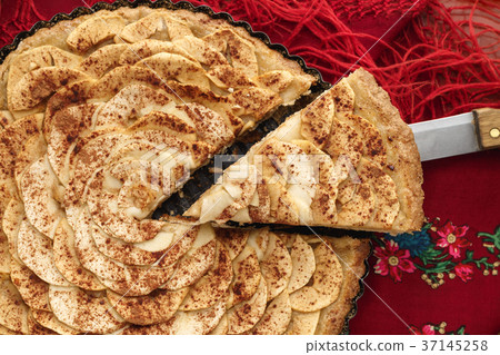 Apple tart on traditional Ukrainian headscarf 37145258