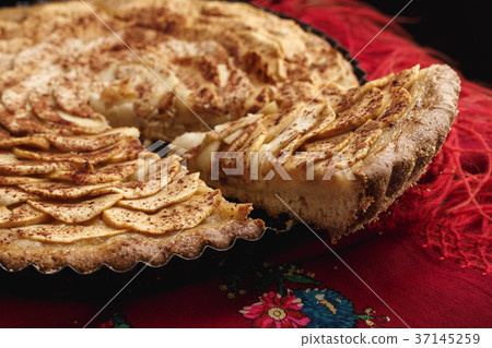 Apple tart on traditional Ukrainian headscarf Apple tart on traditional Ukrainian headscarf 37145259