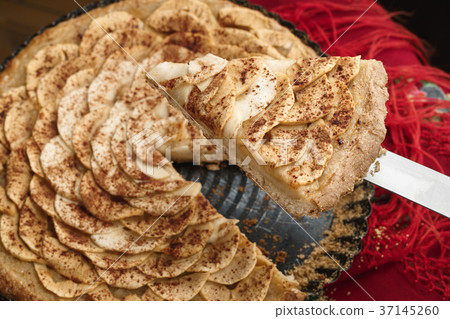 Apple tart on traditional Ukrainian headscarf Apple tart on traditional Ukrainian headscarf 37145260