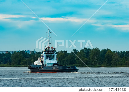 Black tug ship underway Black tug ship underway 37145688