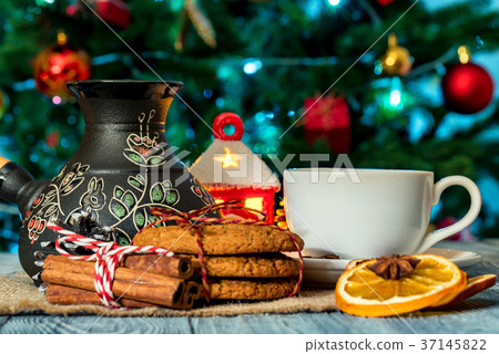Cozy winter setting with cup of coffee and cezva 37145822