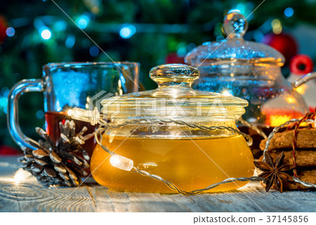 Cozy still life with tea, candle light and honey 37145856