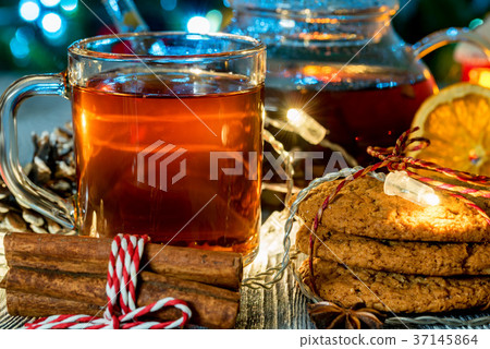 Cozy still life with tea, candle light and cookies 37145864