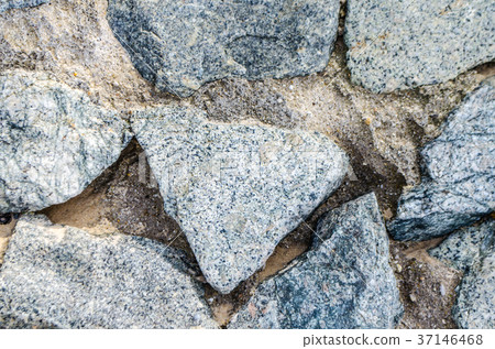 Gray background made of natural stone Gray background made of natural stone 37146468