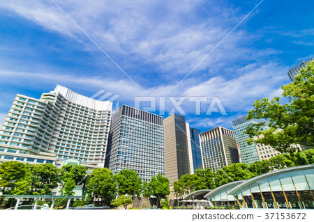 Urban landscape with greenery and office buildings 37153672
