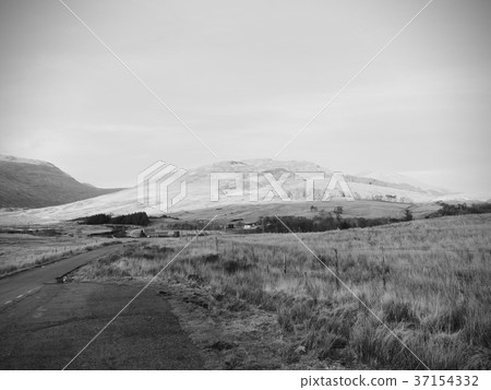 Evening cloudy landscape with mountains Evening cloudy landscape with mountains 37154332