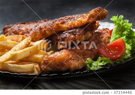 Fried fish in crispy batter with chips Fried fish in crispy batter with chips 37154448