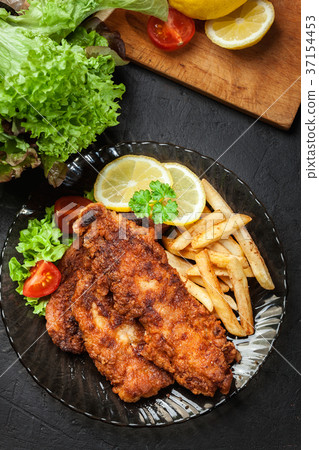 Fried fish in crispy batter with chips Fried fish in crispy batter with chips 37154453