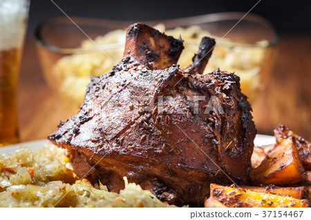 Pork knuckle with fried sauerkraut 37154467
