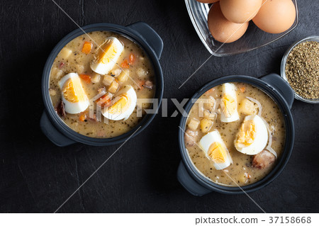 The sour soup made of rye flour with eggs The sour soup made of rye flour with eggs 37158668