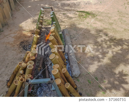 Glutinous Rice Grilled in Bamboo Joints 37160731