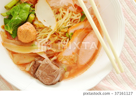 yellow noodles with squid and fish ball in soup yellow noodles with squid and fish ball in soup 37161127