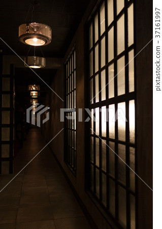 empty long dark corridor with windows light empty long dark corridor with windows light 37161997