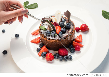 tasting sweet chocolate cake dessert recipe 37163162