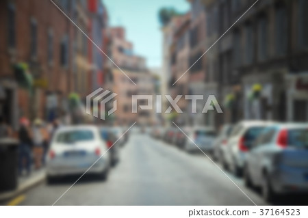 street of Rome with people and cars in blurred 37164523