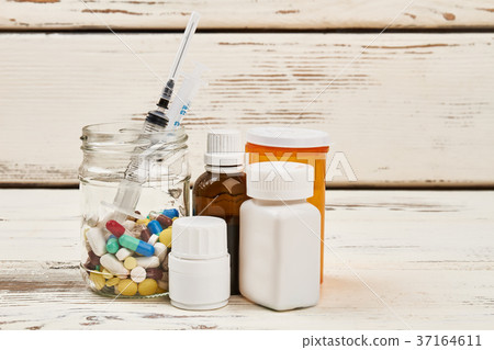 Medications and syringe 37164611