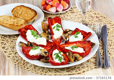 Stuffed grilled pepper filled with cream cheese Stuffed grilled pepper filled with cream cheese 37165178