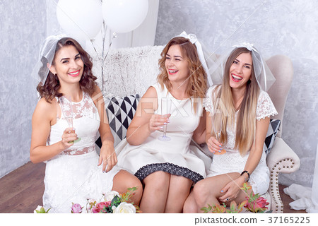 Happy girls having fun, drinking champagne, hen Happy girls having fun, drinking champagne, hen 37165225