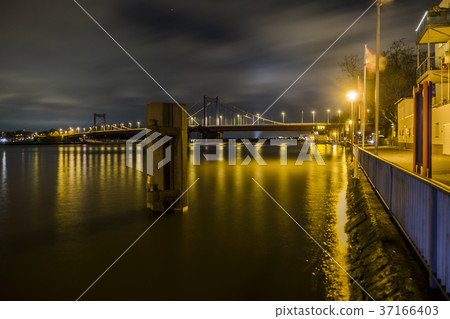 The river Rhine is flooding the promenade The river Rhine is flooding the promenade 37166403
