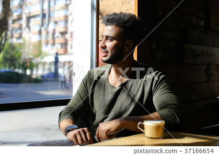 Groom waiting for lover in caf . Groom waiting for lover in caf . 37166654