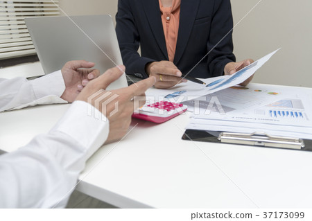 Businessman working at work table Businessman working at work table 37173099