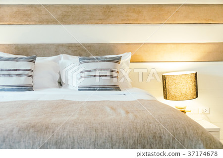 Pillow on bed decoration in bedroom interior 37174678