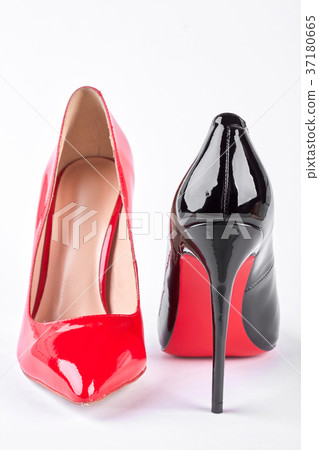 Black and red shoes on high heels. 37180665