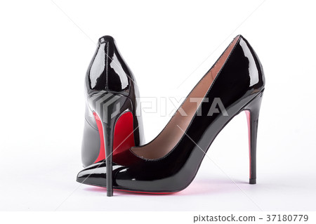 Woman black louboutin on white background. 37180779