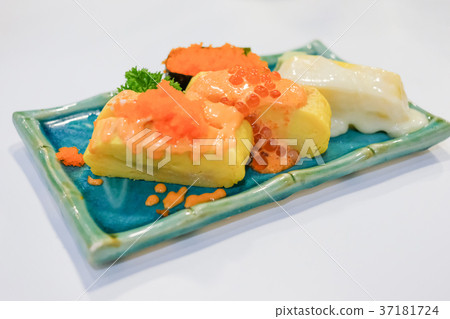 Japanese rolled eggs on white table. 37181724