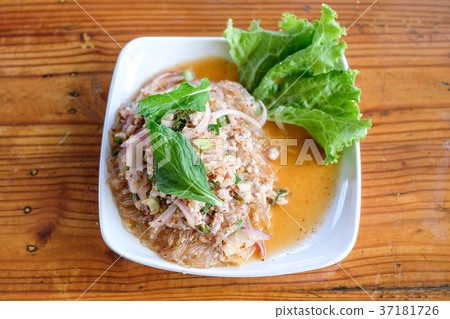 Thai Spicy Vermicelli Salad on wooden table. Thai Spicy Vermicelli Salad on wooden table. 37181726