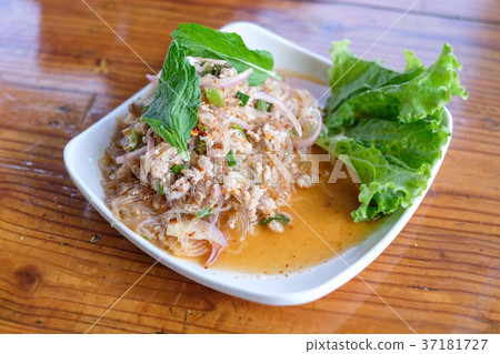 Thai Spicy Vermicelli Salad on wooden table. 37181727