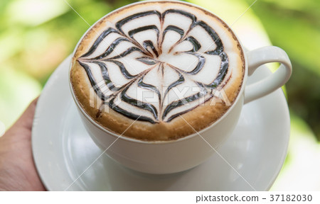 white cup of coffee 37182030