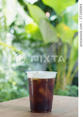 Sparkling Nitro Cold Brew Coffee in take away cup. Sparkling Nitro Cold Brew Coffee in take away cup. 37188064