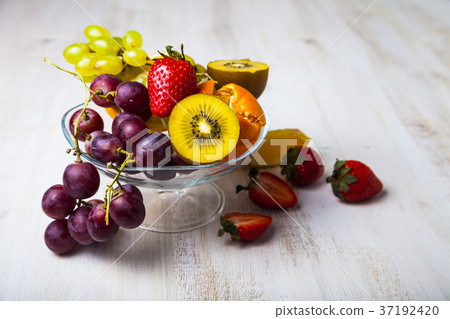 Ripe fruits on a transparent plate Ripe fruits on a transparent plate 37192420
