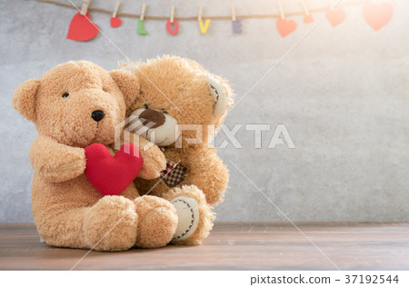 two teddy Bear with Heart on marble background two teddy Bear with Heart on marble background 37192544